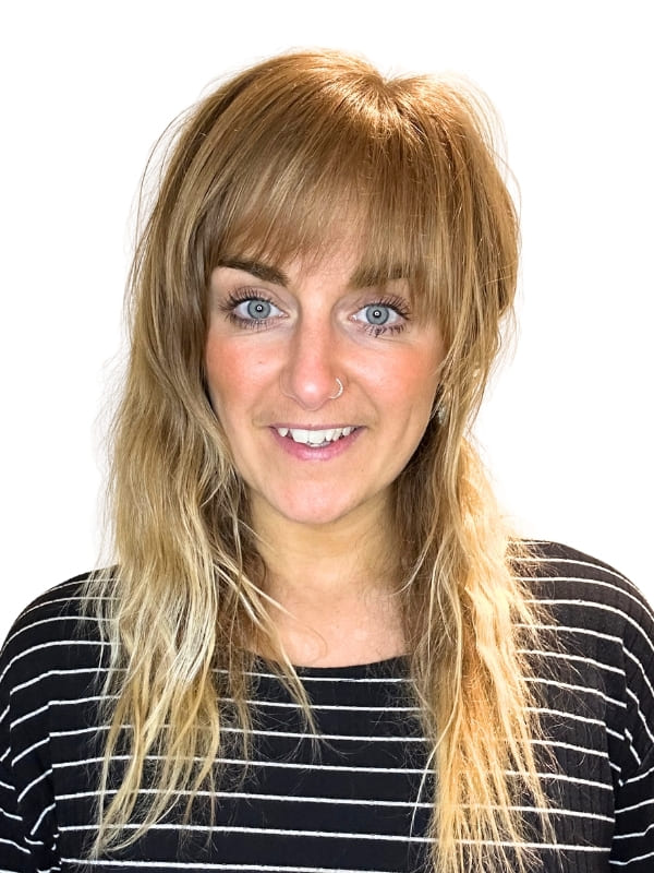 A front profile shot of Jadine Lydia smiling,